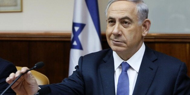 Israeli Prime Minister Benjamin Netanyahu prepares to speak as he opens the weekly cabinet meeting at his Jerusalem office on