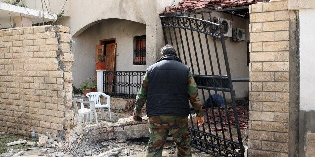 TRIPOLI, LIBYA - FEBRUARY 22: A car bomb went off Sunday near the Iranian embassy in Libyan capital Tripoli, on February 22, 2015. (Photo by Hazem Turkia/Anadolu Agency/Getty Images)