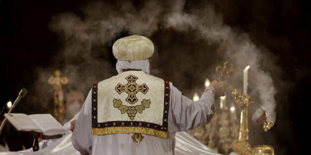 FOLE - In this Tuesday, Feb. 17, 2015 file photo, Pope Tawadros II, the 118th pope of the Coptic Church of Egypt, leads a mass for the Egyptian Christians who were killed in Libya, at St. Mark's Cathedral in Cairo, Egypt.(AP Photo/Amr Nabil, File)
