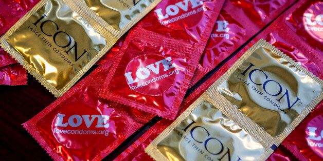 IMAGE DISTRIBUTED FOR AIDS HEALTHCARE FOUNDATION - AIDS Healthcare Foundation condoms during a Valentines's Day press conference to introduce a statewide law requiring condom use by adult film performers, Thursday, Feb. 14, 2013, in Los Angeles. (Bret Hartman /AP Images for AIDS Healthcare Foundation)