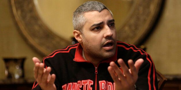 Canadian Al-Jazeera English journalist Mohamed Fahmy, speaks during an interview with The Associated Press in Cairo, Egypt, Thursday, Feb. 19, 2015. Al-Jazeera journalists Fahmy and Baher Mohammed are free pending their retrial, scheduled for Feb. 23. A third colleague, Peter Greste, was released two weeks ago and deported to his home country of Australia. (AP Photo/Hassan Ammar)