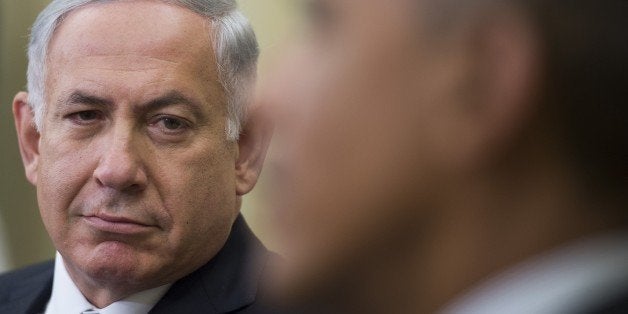 US President Barack Obama speaks with Israeli Prime Minister Benjamin Netanyahu (L) during a bilateral meeting at the White House in Washington, DC, October 1, 2014. AFP PHOTO / Jim WATSON (Photo credit should read JIM WATSON/AFP/Getty Images)