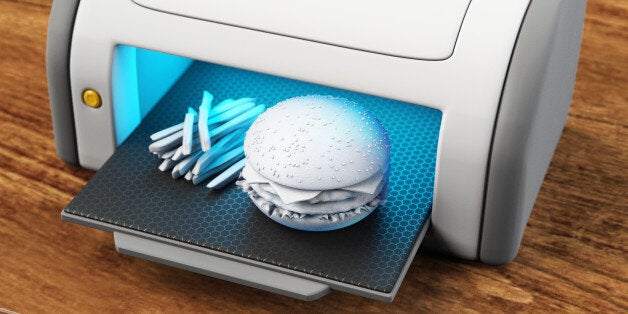 Futuristic illustration of artificial burger and french fires created using a 3D printer.