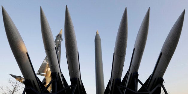 A North Korea's mock Scud-B missile, center, and other South Korean missiles are display at Korea War Memorial Museum in Seoul, South Korea, Friday, Dec. 26, 2014. South Korea, the U.S. and Japan will sign their first-ever trilateral intelligence-sharing pact next week to better cope with North Korea's increasing nuclear and missile threats, Seoul officials said Friday. (AP Photo/Ahn Young-joon)