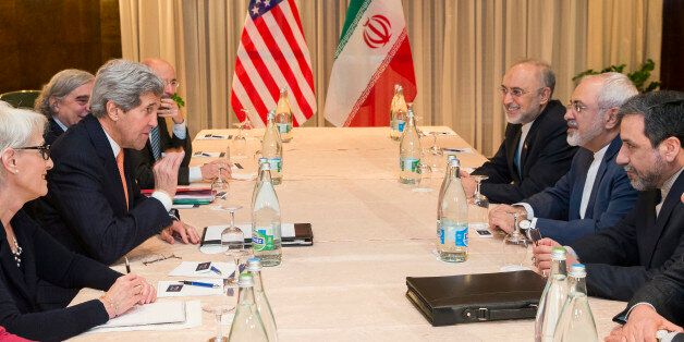 U.S. Secretary of State John Kerry, second from left, meets with Iranian Foreign Minister Mohammad Javad Zarif, second from right, for a new round of nuclear negotiations Wednesday, March 4, 2015, in Montreux, Switzerland. (AP Photo/Evan Vucci, Pool)