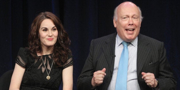 BEVERLY HILLS, CA - JULY 21: Actors Michelle Dockery (L) and Julian Fellowes speak onstage at the Masterpiece Classic 'Downton Abbey, Season 3' panel during day 1 of the PBS portion of the 2012 Summer TCA Tour held at the Beverly Hilton Hotel on July 21, 2012 in Beverly Hills, California. (Photo by Frederick M. Brown/Getty Images)