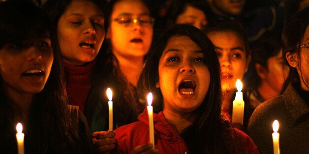 NEW DELHI, INDIA - DECEMBER 16: Akhil Bharatiya Vidyarthi Parishad (ABVP) activists take part in a candle march on the second anniversary of the fatal gang-rape at Jantar Mantar on December 16, 2014 in New Delhi, India. On December 16, 2012, a 23-year-old physiotherapy student was brutally gang raped and by six men, including a juvenile, in a moving bus. The incident unleashed a wave of public anger over levels of violence against women in the country. (Photo by Ajay Aggarwal/Hindustan Times via Getty Images)