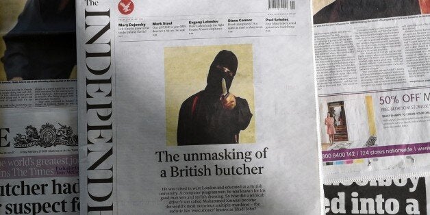 An arrangment of British daily newspapers photographed in London on February 27, 2015 shows the front-page headlines and stor