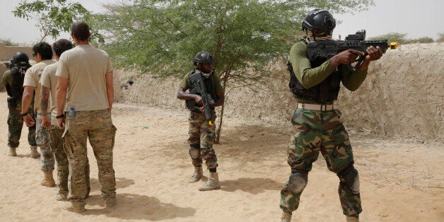 Nigerian special forces participate in an hostage rescue exercise at the end of the Flintlock exercise in Mao, Chad, Saturday, March 7, 2015. The U.S. military and its Western partners conduct this training annually and set up plans long before Boko Haram began attacking its neighbors Niger, Chad and Cameroon. (AP Photo/Jerome Delay)