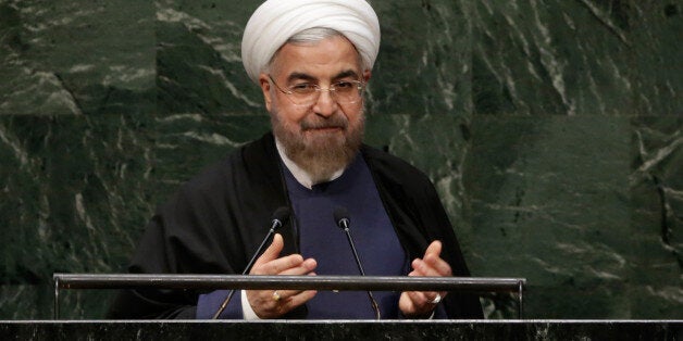 President Hassan Rouhani, of Iran, acknowledges the audience after his address to the 69th session of the United Nations General Assembly, at U.N. headquarters, Thursday, Sept. 25, 2014. (AP Photo/Richard Drew)