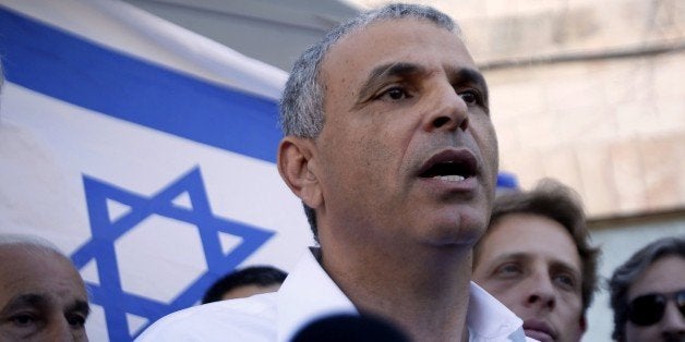 Israeli politician and popular former Likud minister Moshe Kahlon looks on as he visits the Jerusalem outdoors Mahne Yehuda m