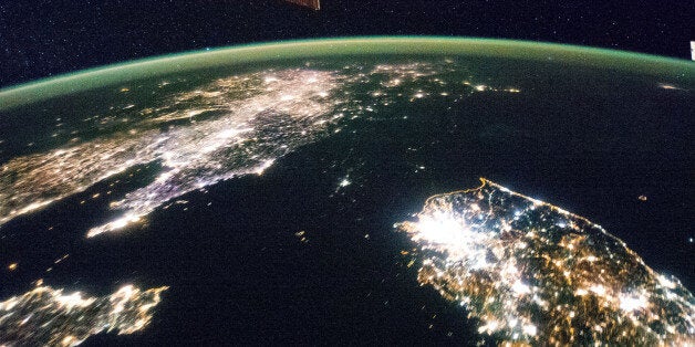 Flying over East Asia, an Expedition 38 crew member on the International Space Station took this night image of the Korean Peninsula. Unlike daylight images, city lights at night illustrate dramatically the relative economic importance of cities, as gauged by relative size. In this north-looking view, it is immediately obvious that greater Seoul is a major city and that the port of Gunsan is minor by comparison. There are 25.6 million people in the Seoul metropolitan area-more than half of South Korea's citizens-while Gunsan's population is 280,000. North Korea is almost completely dark compared to neighboring South Korea and China. The darkened land appears as if it were a patch of water joining the Yellow Sea to the Sea of Japan. The capital city, Pyongyang, appears like a small island, despite a population of 3.26 million (as of 2008). The light emission from Pyongyang is equivalent to the smaller towns in South Korea. Coastlines are often very apparent in night imagery, as shown by South Korea's eastern shoreline. But the coast of North Korea is difficult to detect. These differences are illustrated in per capita power consumption in the two countries, with South Korea at 10,162 kilowatt hours and North Korea at 739 kilowatt hours.Image credit: NASA Original image:www.flickr.com/photos/nasa2explore/12752402055/in/set-721...More about space station research:www.nasa.gov/mission_pages/station/research/index.htmlView more photos like this in the "NASA Earth Images" Flickr photoset:www.flickr.com/photos/28634332@N05________________________________These official NASA photographs are being made available for publication by news organizations and/or for personal use printing by the subject(s) of the photographs. The photographs may not be used in materials, advertisements, products, or promotions that in any way suggest approval or endorsement by NASA. All Images used must be credited. For information on usage rights please visit: www.nasa.gov/audience/formedia/features/MP_Photo_Guidelin...