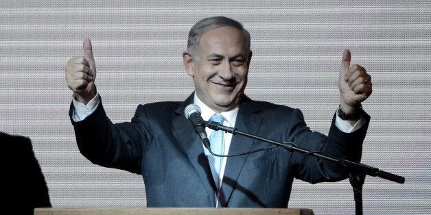TEL AVIV, ISRAEL - MARCH 18: Israeli Prime Minister and the leader of the Likud Party Benjamin Netanyahu greets supporters at
