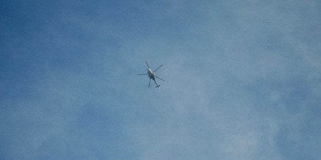 ALEPPO, SYRIA - DECEMBER 17: A helicopter of Assad forces during the clashes at opponents' regions where Assad regime forces