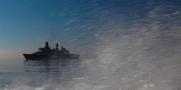 The Danish warship "Esbern Snare" escorting the cargo ships transporting Syriaâs most dangerous chemical weapons out of the strife-torn country, is photographed, from a boat, docked outside of Larnaca port, Cyrpus, Tuesday, May 13, 2014. Denmarkâs foreign minister Martin Lidegaard is urging Syria to give up the last of its chemical weapons agents in the next few days in order to meet a June 30 deadline for completely ridding the war-torn country of its lethal stockpile. A Danish-Norwegian flotilla consisting of two warships and two cargo vessels has been moving the chemicals out of Syria for eventual destruction since January. (AP Photo/Petros Karadjias)