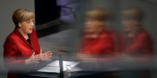 German Chancellor Angela Merkel gestures during her speech as part of a meeting of the German federal parliament, Bundestag,