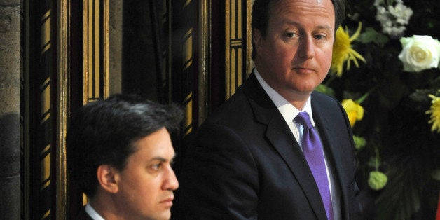 Britain's Prime Minister David Cameron and Labour Party leader Ed Miliband, left, attend a service to celebrate the 60th anniversary of the coronation of Britain's Queen Elizabeth II, Westminster Abbey, London, Tuesday, June 4, 2013. (AP Photo/Anthony Devlin, Pool)