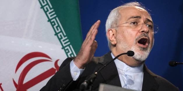 Iranian Foreign Minister Javad Zarif gestures as he speaks during a press conference, at the Swiss Federal Institute of Techn