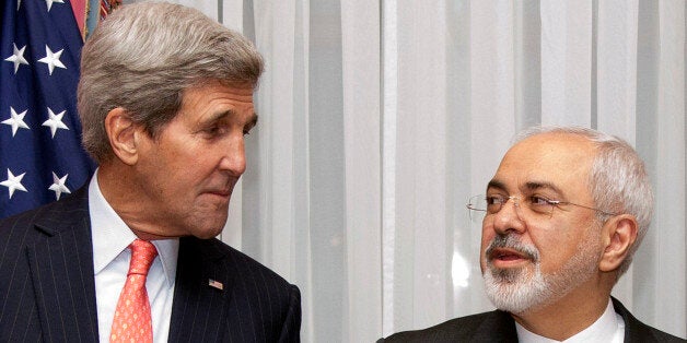 U.S. Secretary of State John Kerry, left, listens to Iran's Foreign Minister Mohammad Javad Zarif, right, before resuming talks over Iran's nuclear program in Lausanne, Switzerland, Monday, March 16, 2015. The United States and Iran are plunging back into negotiations in a bid to end a decades-long standoff that has raised the specter of an Iranian nuclear arsenal, a new atomic arms race in the Middle East and even a U.S. or Israeli military intervention. (AP Photo/Brian Snyder, Pool)