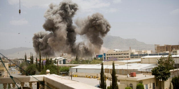 Smoke billows from a Saudi-led airstrike on Sanaa, Yemen, Wednesday, April 8, 2015. A state-run broadcaster in Iran is reporting that the Islamic Republic has sent a navy destroyer and another vessel to waters near Yemen amid a Saudi-led airstrike campaign. (AP Photo/Hani Mohammed)