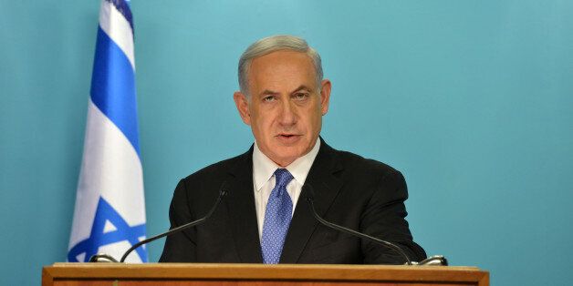 JERUSALEM, ISRAEL - APRIL 3: (ISRAEL OUT) In this handout provided by the Israeli Government Press Office, Israel Prime Minister Benjamin Netanyahu (R) delivers a statement to the press on April 3, 2015 in Jerusalem, Israel. Netanyahu delivered a speach discussing a pending nuclear deal with Iran. (Photo by Kobi Gideon /GPO via Getty Images)
