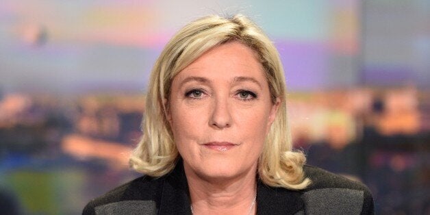 ALTERNATIVE CROP French far-right leader and Front National party president, Marine Le Pen is pictured prior to speaking during French TV channel TF1 evening news program on April 9, 2015 in Boulogne-Billancourt, a Paris' suburb. France's far-right was plunged into disarray as National Front leader Marine Le Pen openly split with her father and party founder after gas chamber comments she described as 'political suicide'. AFP PHOTO / POOL / MARTIN BUREAU (Photo credit should read MARTIN BUREAU/AFP/Getty Images)
