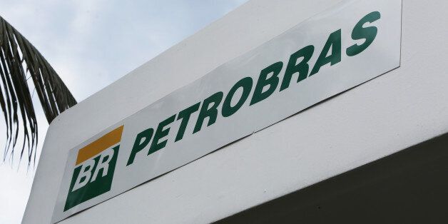 RIO DE JANEIRO, BRAZIL - FEBRUARY 05: A Petrobras sign is displayed at a gas station of Brazil's government-run oil company Petrobras on February 5, 2015 in Rio de Janeiro, Brazil. The chief executive of the Brazilian oil giant, along with the entire board of directors, resigned in the midst of a major corruption scandal. The scandal was uncovered by the Federal Police following an initial investigation into money laundering at a single gas station. (Photo by Mario Tama/Getty Images)