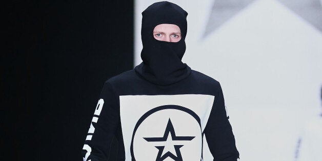 MOSCOW, RUSSIA - MARCH 31: A model walks the runway at the Special Collection by Russian Army Design Bureau show during the M