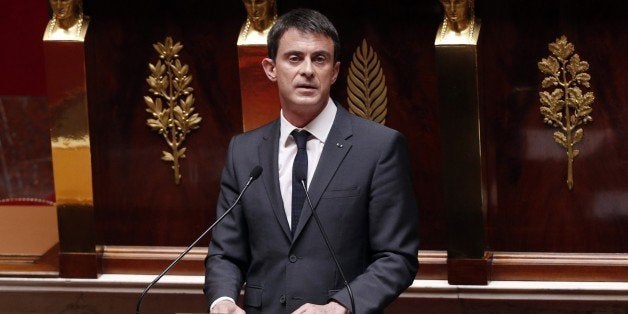 French Prime Minister Manuel Valls delivers a speech at the National Assembly in Paris on April 13, 2015, as French lawmakers debated a new law on intelligence gathering. More than three months after Islamist attacks in Paris that killed 17, French MPs on April 13 began debating controversial new laws allowing spies to hoover up data from suspected jihadists. AFP PHOTO / FRANCOIS GUILLOT (Photo credit should read FRANCOIS GUILLOT/AFP/Getty Images)