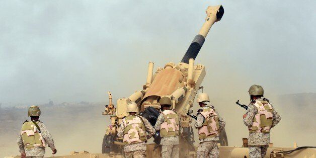 Saudi soldiers from an artillery unit fire shells towards Yemen from a post close to the Saudi-Yemeni border, in southwestern Saudi Arabia, on April 13, 2015. Saudi Arabia is leading a coalition of several Arab countries which since March 26 has carried out air strikes against the Shiite Huthis rebels, who overran the capital Sanaa in September and have expanded to other parts of Yemen. AFP PHOTO / FAYEZ NURELDINE (Photo credit should read FAYEZ NURELDINE/AFP/Getty Images)