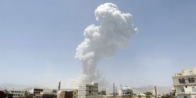 Smoke billows from the Fajj Attan Hill following a reported airstrike by the Saudi-led coalition on an army arms depot, now u