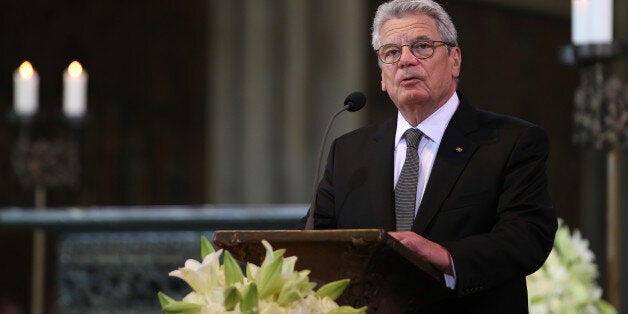 German President Joachim Gauck delivers a speech during a mourning ceremony at the Cathedral in Cologne, Germany, Friday, April 17, 2015. A mourning ceremony is held in the Cathedral in memory of the 150 victims of the Germanwings plane crash in the French Alps last month. (Oliver Berg/Pool Photo via AP)