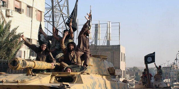 FILE - This undated image posted by the Raqqa Media Center, in Islamic State group-held territory, on Monday, June 30, 2014,