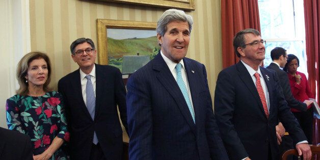 WASHINGTON, DC - APRIL 28: (AFP OUT) U.S. Secretary of State John Kerry (C) stands with Defense Secretary Ashton Carter (R), Ambassador Caroline Kennedy (L) and Treasury Secretary Jack Lew (2ndL) while U.S. President Barack Obama holds a bilateral meeting with Japanese Prime Minister Shinzo Abe in the Oval Office at the White House April 28, 2015 in Washington, DC. The Japanese Prime Minister and his wife are on an official visit to Washington. (Photo by Mark Wilson/Getty Images)