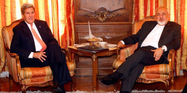U.S. Secretary of State John Kerry, left, meets with Iran's Foreign Minister Mohammad Javad Zarif, Monday, April 27, 2015, in