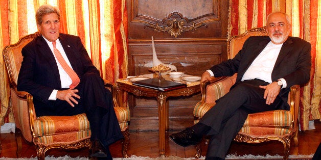 U.S. Secretary of State John Kerry, left, meets with Iran's Foreign Minister Mohammad Javad Zarif, Monday, April 27, 2015, in New York. Kerry and Zarif are both in New York to attend a United Nations conference on nuclear non-proliferation. (AP Photo/Jason DeCrow, Pool)