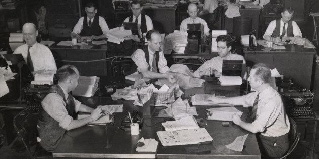General view of the Kansas City bureau of the Associated Press. In the foreground is the East desk. Next is the Coast desk, then the State desks and in the background the Local desk, April 22, 1940 (AP Photo/AP Corporate Archives)