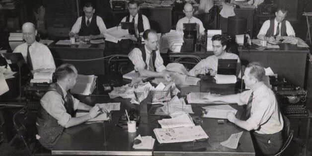 General view of the Kansas City bureau of the Associated Press. In the foreground is the East desk. Next is the Coast desk,