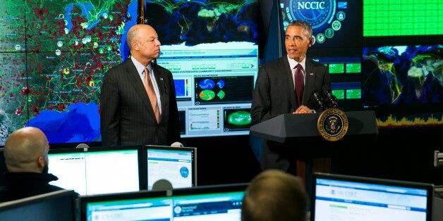 ARLINGTON, VA - JANUARY 13: U.S. President Barack Obama delivers remarks at the National Cybersecurity and Communications Integration Center (NCCIC) on January 13, 2015 in Arlington, Virginia. President Obama discussed efforts to improve the government's ability to collaborate with industry to combat cyber threats. He is joined by Secretary of Homeland Security Secretary Jeh Johnson. (Photo by Kristoffer Tripplaar-Pool/Getty Images)