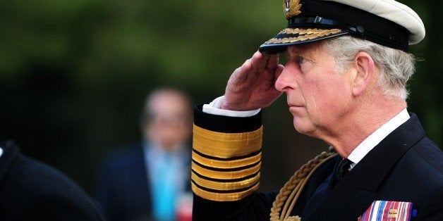 Britain's Prince Charles of Wales stays in attention during a memorial service marking the 100th anniversary of the start of