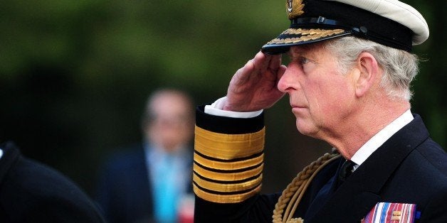 Britain's Prince Charles of Wales stays in attention during a memorial service marking the 100th anniversary of the start of the Battle of Gallipoli on April 24, 2015 at the Helles Memorial on the Gallipoli peninsula. A century ago, Allied troops waded ashore on the Gallipoli peninsula at the start of an ill-fated land campaign to wrest the Dardanelles Strait from the Ottoman Empire. The disastrous World War I battle began on April 25, 1915, and pitted troops from countries including Australia, Britain, France and New Zealand against the Ottoman forces backed by Germany. AFP PHOTO / OZAN KOSE (Photo credit should read OZAN KOSE/AFP/Getty Images)