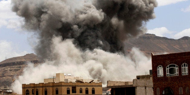 Smoke rises after a Saudi-led airstrike targeted a military base in Sanaa, Yemen, Sunday, May 24, 2015. Fighting raged on in Yemen on Sunday, with airstrikes by the Saudi-led coalition hitting rebel targets in multiple cities, including the capital, while street battles in the city of Taiz killed several civilians. (Photo/Shohdi Alsofi)