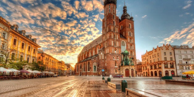 St. Maryâs Basilica on the Main Market Square in KrakÃ³w is one of the townâs famous landmarks. I already showed you the Altarpiece inside of the church, now you can see the exterior.Extraordinary are the two unequal towers, the higher one is 81m high, the other one is 12m smaller. According to an ancient legend, the towers were built by two brothers â each worked on one tower. When one of them finished his tower, he was worried that his brother could outdo his work and build a higher one. To prevent that, he stabbed him to death and the church tower was left unfinished.For the Blog-Entry see: sumfinity.com/2014/02/23/st-marys-basilica-krakow/Auf Deutsch: de.sumfinity.com/2014/02/23/marienkirche-krakau-polen/--------------------------------------------------------------------------------------------------------------------------------------Website | Twitter | Facebook | Pinterest | Google +--------------------------------------------------------------------------------------------------------------------------------------You're free to use my work on your private website, as long as you set a follow-able hyperlink to sumfinity.com and mention me, Nico Trinkhaus, as the author. Check this for details on the copyright and licensing.