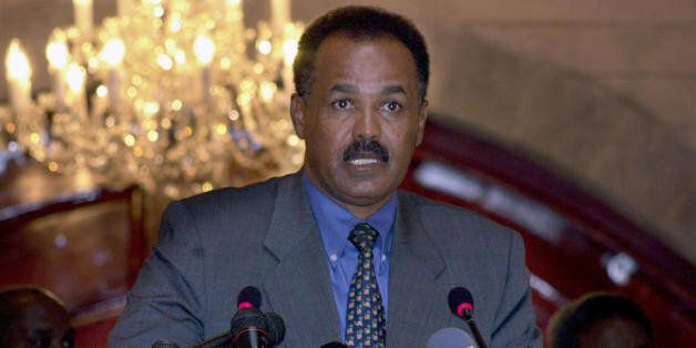 SANAA, YEMEN: Eritrean President Isaias Afeworki speaks during a joint press conference with his Yemeni counterpart Ali Abdullah Saleh in Sanaa 10 December 2004. Afeworki is on an official visit to Yemen which began two days ago to discuss bilateral issues. A dispute between the two countries over the strategic Hanish islands in the Red Sea erupted into an armed conflict in December 1995, but Sanaa and Asmara ended the dispute after a decision by the International Court of Justice in The Hague. AFP PHOTO/KHALED FAZAA (Photo credit should read KHALED FAZAA/AFP/Getty Images)