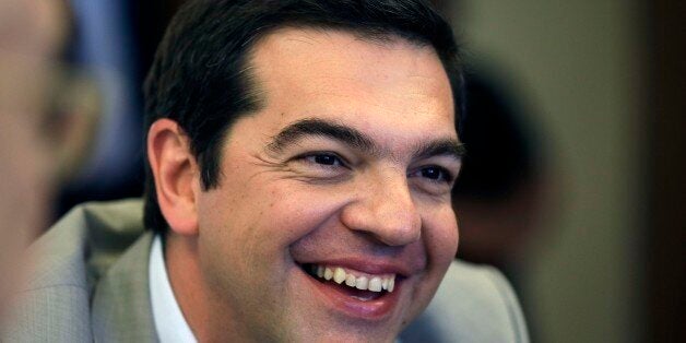 Greece's Prime Minister Alexis Tsipras leads a meeting at the Education Ministry in Athens, Tuesday, June 2, 2015. Tsipras sa