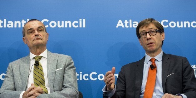 German Ambassador to the US, Peter Wittig (R) speaks alongside French Ambassador to the US, Gerard Araud about the Iranian nuclear negotiations at the Atlantic Council in Washington, DC, May 26, 2015. AFP PHOTO / SAUL LOEB (Photo credit should read SAUL LOEB/AFP/Getty Images)