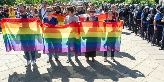 Gay activists hold the first Gay Pride march in Kiev, since fighting with pro-Moscow rebels broke out in the east of the country last year, on June 6, 2015. AFP PHOTO / VOLODYMYR SHUVAYEV (Photo credit should read VOLODYMYR SHUVAYEV/AFP/Getty Images)