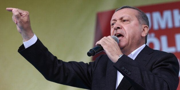 Turkish President Recep Tayyip Erdogan speaks during a rally in Golbasi district of Ankara on June 5, 2015 AFP PHOTO/ADEM ALTAN (Photo credit should read ADEM ALTAN/AFP/Getty Images)