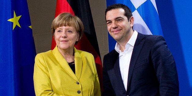 BERLIN, GERMANY - MARCH 23: German Chancellor Angela Merkel and Greek Prime Minister Alexis Tsipras depart after speaking to the media following talks at the Chancellery on March 23, 2015 in Berlin, Germany. The two leaders are meeting as relations between the Tsipras government and Germany have soured amidst contrary views between the two countries on how Greece can best work itself out of its current economic morass. (Photo by Carsten Koall/Getty Images)