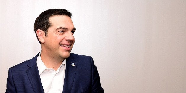 Greece's Prime Minister Alexis Tsipras leaves after meeting with Brazil's President Dilma Rousseff on the sidelines of a European Union and the Community of Latin America and Caribbean states (EU-CELAC) summit summit in Brussels, June 11, 2015. AFP PHOTO/Emmanuel Dunand (Photo credit should read EMMANUEL DUNAND/AFP/Getty Images)